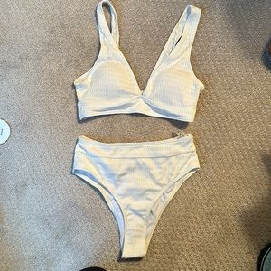 Unworn off white bathing suit, size small